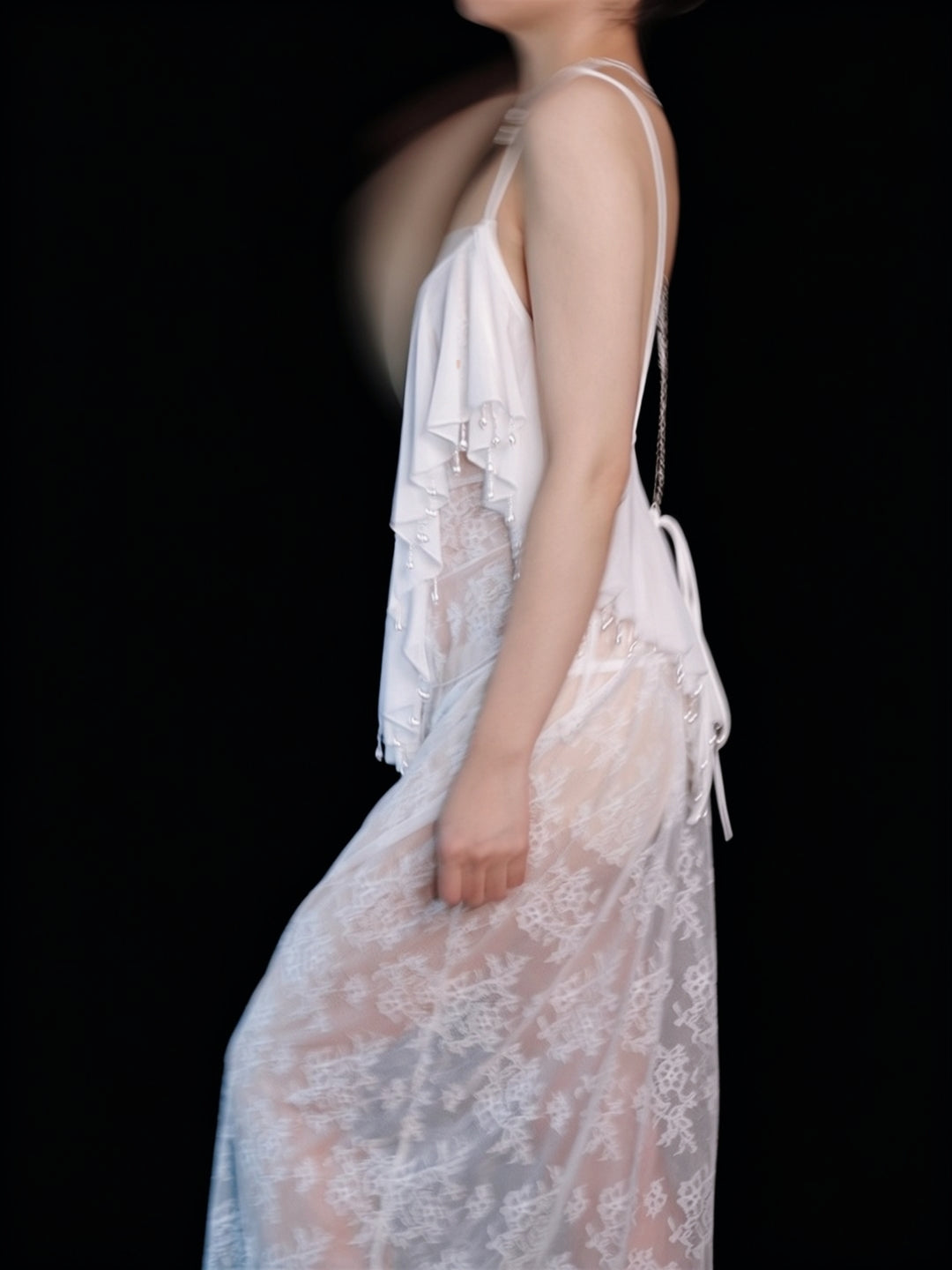 The Margot handmade lace slip, side