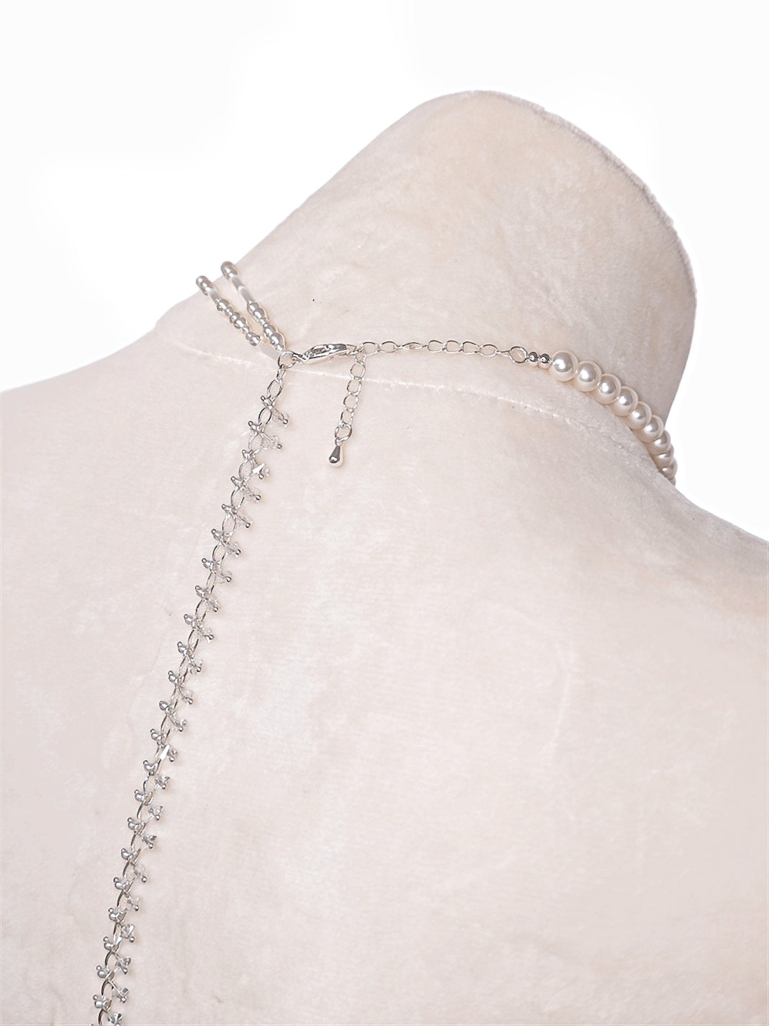 Pearl body chain worn as a necklace